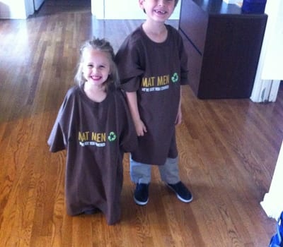Two kids wearing Mat Men shirts