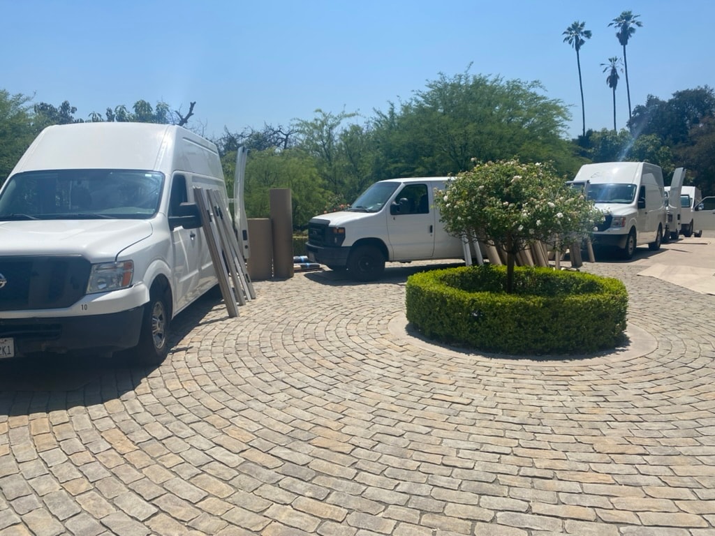 Mat Men fleet parked on tropical lot