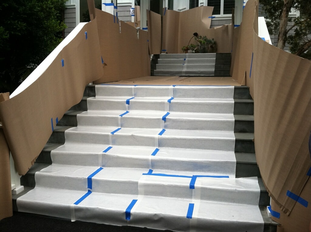 Mat Men protecting stairs on location