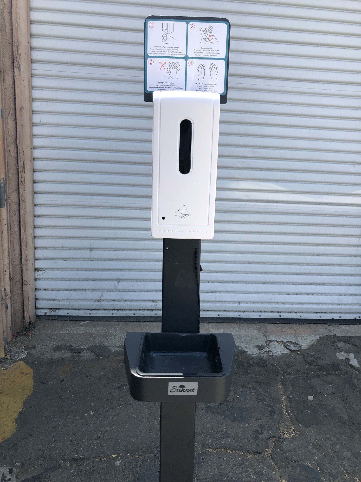 Touchless sanitizer station on a stand